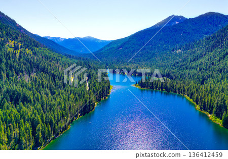 Landscape of mountain and forest of Cooper lake. Nature landscape. Cooper Lake. Scenic nature of popular hiking Cooper lake. Cooper lake with mountain landscape. Peaceful lakeside scenery Landscape of mountain and forest of Cooper lake. Nature landscape. Cooper Lake. Scenic nature of popular hiking Cooper lake. Cooper lake with mountain landscape. Peaceful lakeside scenery 136412459