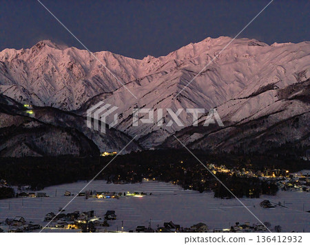 Mount Karamatsu and Mount Goryu illuminated by moonlight before dawn in Hakuba Village, Nagano Prefecture (aerial shot by drone) Mount Karamatsu and Mount Goryu illuminated by moonlight before dawn in Hakuba Village, Nagano Prefecture (aerial shot by drone) 136412932