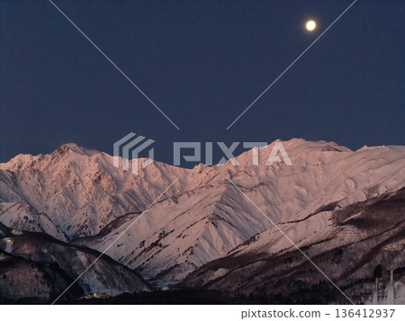 Mount Karamatsu and Mount Goryu illuminated by moonlight before dawn in Hakuba Village, Nagano Prefecture (aerial shot by drone) Mount Karamatsu and Mount Goryu illuminated by moonlight before dawn in Hakuba Village, Nagano Prefecture (aerial shot by drone) 136412937