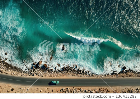 Vehicle on Coastal Road Above Turquoise Ocean Waves and Scenic Shoreline Vehicle on Coastal Road Above Turquoise Ocean Waves and Scenic Shoreline 136413282