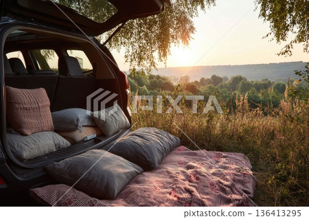 Scenic Road Trip with Pets and Open Car Trunk Amidst Nature at Sunset Scenic Road Trip with Pets and Open Car Trunk Amidst Nature at Sunset 136413295