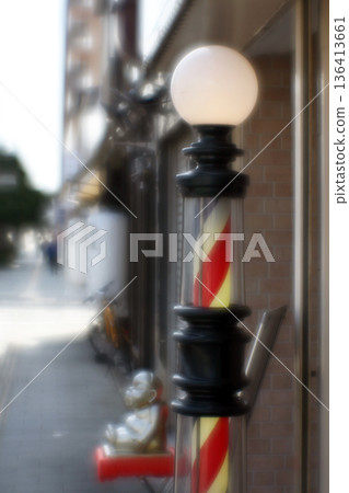 Barber shop pole sign (soft focus) Barber shop pole sign (soft focus) 136413661