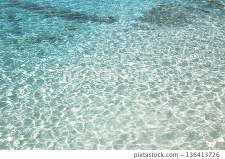 A mesh of light reflected on the bottom of the water A mesh of light reflected on the bottom of the water 136413726