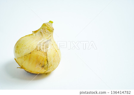 Spring onions placed on a white background 136414782