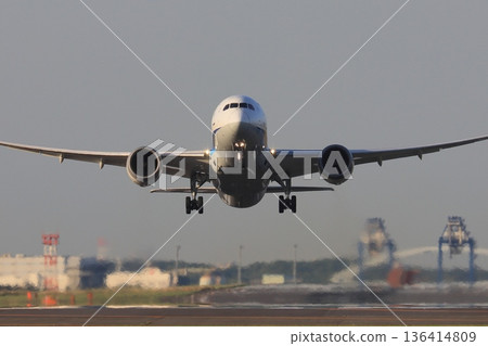 Airliner taking off and rising Airliner taking off and rising 136414809
