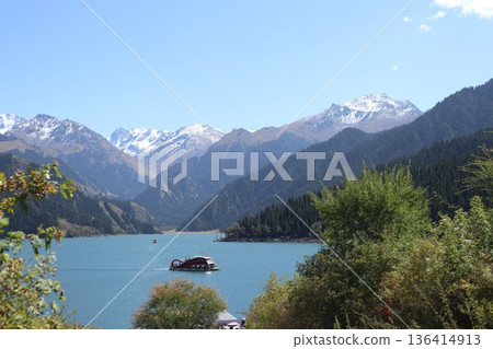 Traveling along the Silk Road in China: Scenery of Tianshan Tianchi in Urumqi Traveling along the Silk Road in China: Scenery of Tianshan Tianchi in Urumqi 136414913