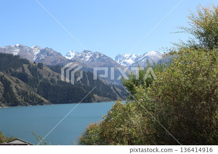 Traveling along the Silk Road in China: Scenery of Tianshan Tianchi in Urumqi Traveling along the Silk Road in China: Scenery of Tianshan Tianchi in Urumqi 136414916