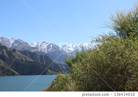 Traveling along the Silk Road in China: Scenery of Tianshan Tianchi in Urumqi Traveling along the Silk Road in China: Scenery of Tianshan Tianchi in Urumqi 136414918