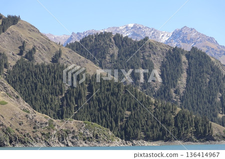 Traveling along the Silk Road in China: Scenery of Tianshan Tianchi in Urumqi Traveling along the Silk Road in China: Scenery of Tianshan Tianchi in Urumqi 136414967