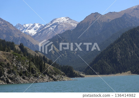 Traveling along the Silk Road in China: Scenery of Tianshan Tianchi in Urumqi Traveling along the Silk Road in China: Scenery of Tianshan Tianchi in Urumqi 136414982