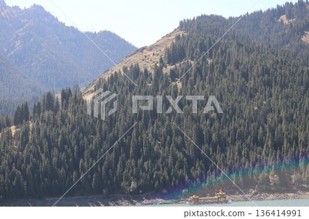 Traveling along the Silk Road in China: Scenery of Tianshan Tianchi in Urumqi Traveling along the Silk Road in China: Scenery of Tianshan Tianchi in Urumqi 136414991