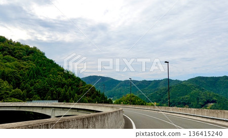 A view of the Sky Loop Bridge on the Birin Highway of the Sakamoto-Takahama Line, Oi Town, Oi District, Fukui Prefecture A view of the Sky Loop Bridge on the Birin Highway of the Sakamoto-Takahama Line, Oi Town, Oi District, Fukui Prefecture 136415240