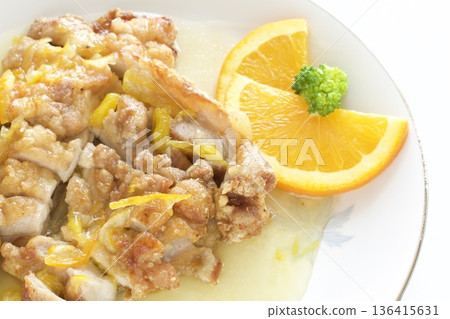 Fried chicken with orange sauce 136415631