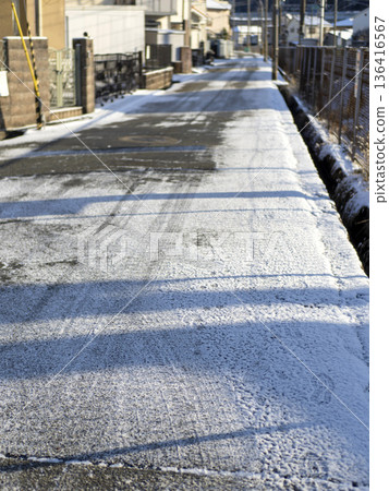 Icy early morning road 136416567