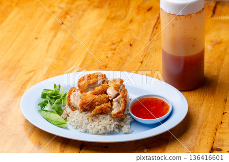 Thai Hainanese Chicken Rice with Crispy Chicken and Dipping Sauce Thai Hainanese Chicken Rice with Crispy Chicken and Dipping Sauce 136416601