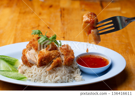 Thai Hainanese Chicken Rice with Crispy Chicken and Dipping Sauce Thai Hainanese Chicken Rice with Crispy Chicken and Dipping Sauce 136416611