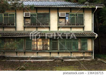 An old, abandoned inn building An old, abandoned inn building 136416715