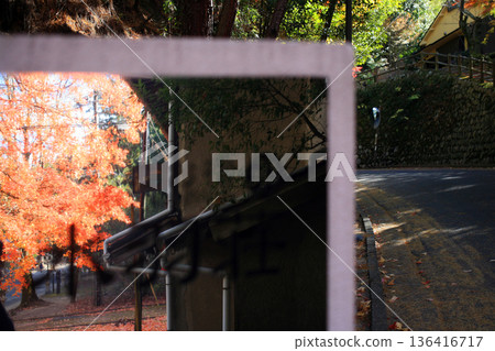 Mirror sign and cut-through road Mirror sign and cut-through road 136416717