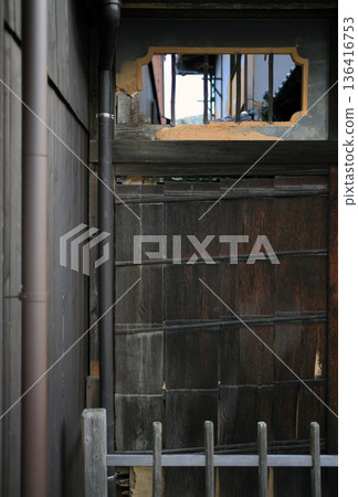 Transom of the back door of an old house Transom of the back door of an old house 136416753