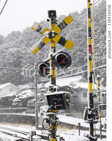 Snow-covered railroad crossing on the Nose Electric Railway's Myoken Line Snow-covered railroad crossing on the Nose Electric Railway's Myoken Line 136416936