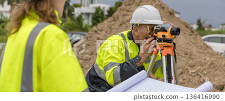 Engineer survey team checking construction project  inspection work construction site . 136416990