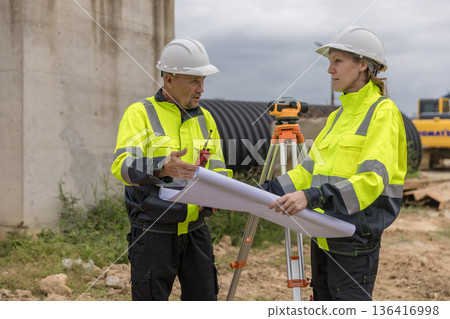 Engineer survey team checking construction project  inspection work construction site . 136416998
