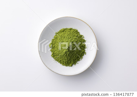 Vibrant green Japanese matcha against a white background Vibrant green Japanese matcha against a white background 136417877
