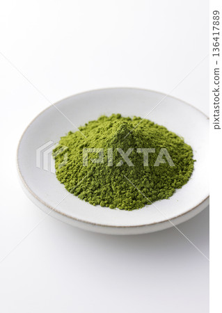 Vibrant green Japanese matcha against a white background Vibrant green Japanese matcha against a white background 136417889