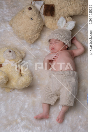 Newborn sleeping. Newborn Babies Sleep in Bed.  136418032