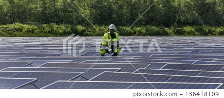 Engineer Checking and working setup Floating solar panels or solar cell Platform system on the lake. Engineer Checking and working setup Floating solar panels or solar cell Platform system on the lake. 136418109