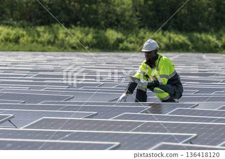 Engineer Checking and working setup Floating solar panels or solar cell Platform system on the lake. Engineer Checking and working setup Floating solar panels or solar cell Platform system on the lake. 136418120