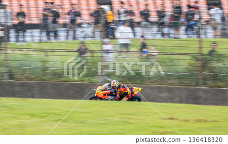 A realistic racing scene with the spectator seats as a backdrop A realistic racing scene with the spectator seats as a backdrop 136418320