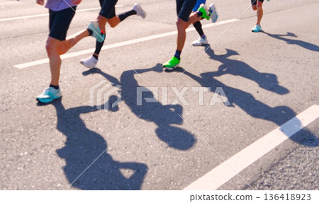 Marathon runners' figures Marathon runners' figures 136418923