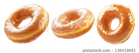 Tasty round donut topped with caramel and vanilla glaze swirl, isolated on white transparent background Tasty round donut topped with caramel and vanilla glaze swirl, isolated on white transparent background 136419081
