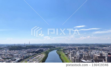Refreshing summer blue sky | Wind blowing across the Tsurumi River and a railway scene | Yokohama City, Kanagawa Prefecture Refreshing summer blue sky | Wind blowing across the Tsurumi River and a railway scene | Yokohama City, Kanagawa Prefecture 136419346