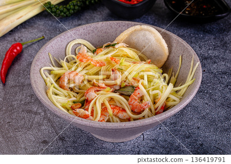 Asian salad with mango and prawn 136419791
