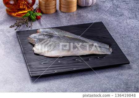 Raw seabass fish fillet for cooking 136419848