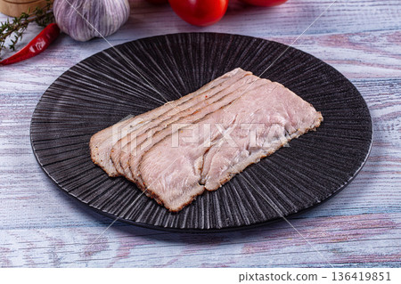 Sliced Pastrami meat fillet with spices Sliced Pastrami meat fillet with spices 136419851