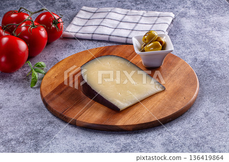 French Gruyere cheese over board 136419864