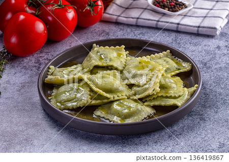Italian dumplings ravioli with spinach 136419867