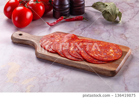 Spicy sliced chorizo sausages snack Spicy sliced chorizo sausages snack 136419875