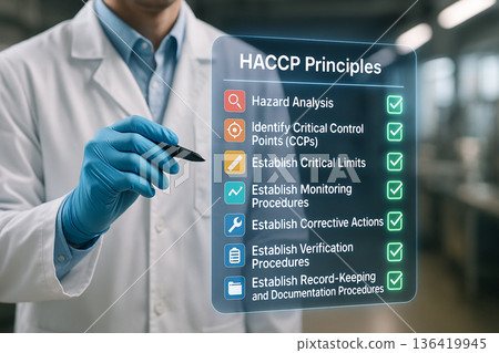Engineer in white uniform checking food safety HACCP compliance principles using digital interface with stylus in modern food industry production plant Engineer in white uniform checking food safety HACCP compliance principles using digital interface with stylus in modern food industry production plant 136419945