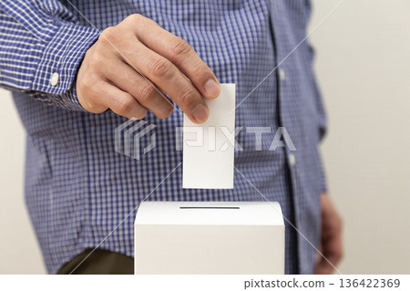 Hands of a man voting Hands of a man voting 136422369