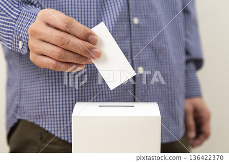 Hands of a man voting Hands of a man voting 136422370