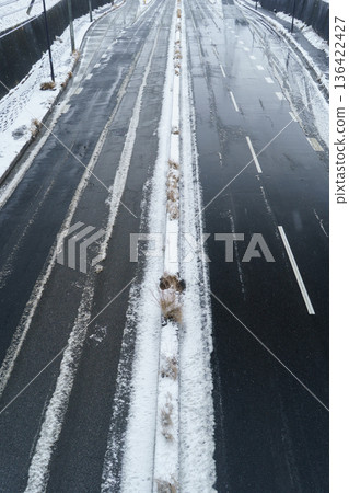 Image of a dangerous road after snowfall Image of a dangerous road after snowfall 136422427