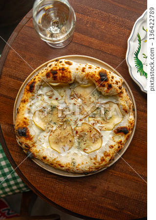 Pizza with pear gorgonzola and cheese Pizza with pear gorgonzola and cheese 136422789