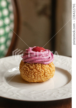 Choux pastry with raspberry cream topping Choux pastry with raspberry cream topping 136422791