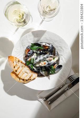 Steamed mussels with bread and white wine Steamed mussels with bread and white wine 136422804