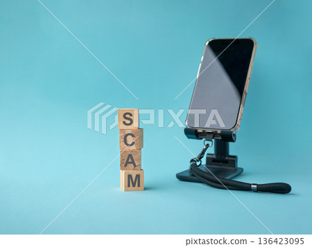 Word, Scam on wood blocks stacked up Word, Scam on wood blocks stacked up 136423095