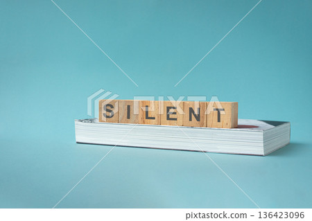 Word Silent on wooden blocks. Word Silent on wooden blocks. 136423096